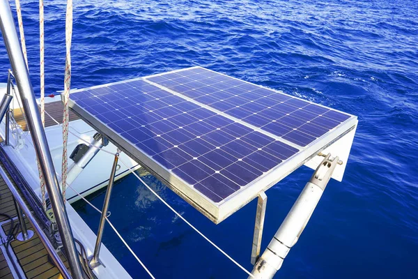 Solar panel on sailing yacht in the sea. Monocrystalline and Polycrystalline Solar Panels in yachting. Solar panel, photovoltaic, alternative electricity source on boat.