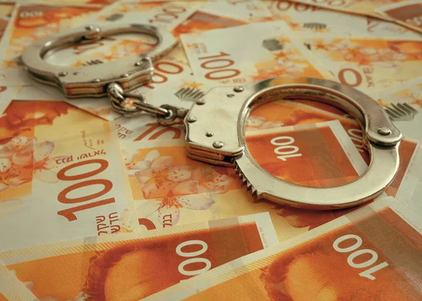 Handcuffs Background Israeli 100 Banknote Money Police Handcuffs Financial Crime — Foto de Stock