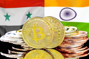 Bitcoins on flag Syria and India background. Concept for investors in cryptocurrency and Blockchain technology in Syria and India