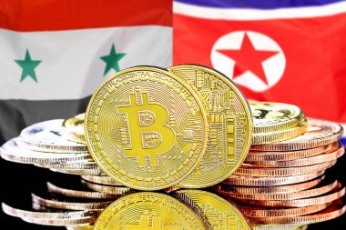 Bitcoins on flag Syria and North Korea background. Concept for investors in cryptocurrency and Blockchain technology in Syria and North Korea
