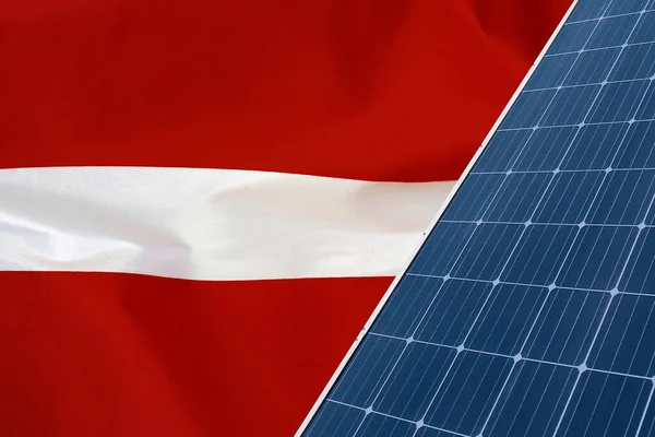 Painéis Solares Contra Fundo Bandeira Letónia Bateria Solar Gera Uma — Fotografia de Stock
