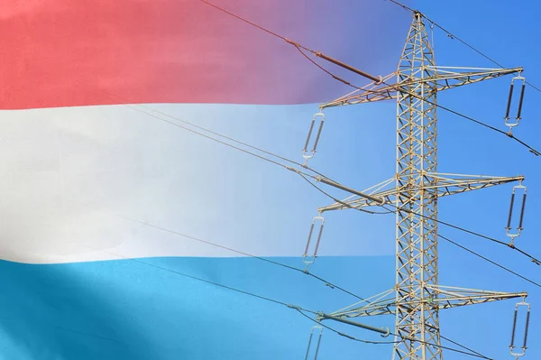 Luxembourg flag on electric pole background. Power shortage and increased energy consumption in Luxembourg. Energy development and energy crisis in Luxembourg