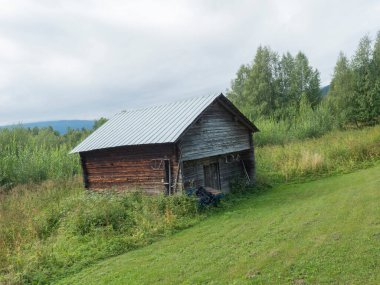 Small log cabin, wooden house in Kvikkokk at northern Sweden Lapland.