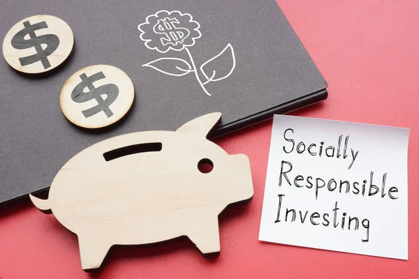 Socially responsible investing SRI is shown on the business photo using the text — стоковое фото