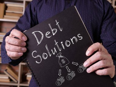 Borç çözümleri metni kullanarak bir iş fotoğrafında gösterilir