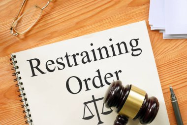 Restraining Order is shown on a photo using the text clipart