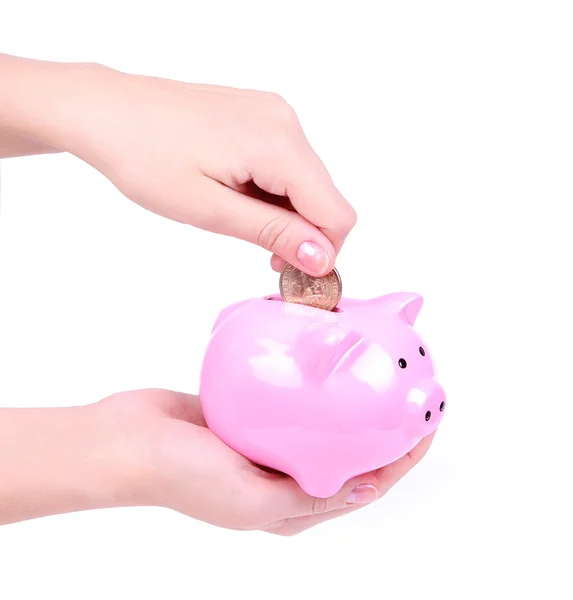 Carregando um porquinho isolado em branco, economizando dinheiro — Fotografia de Stock