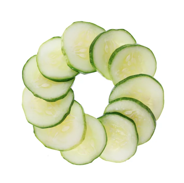 Cucumber slices is circle isolated on white — Stock Photo, Image