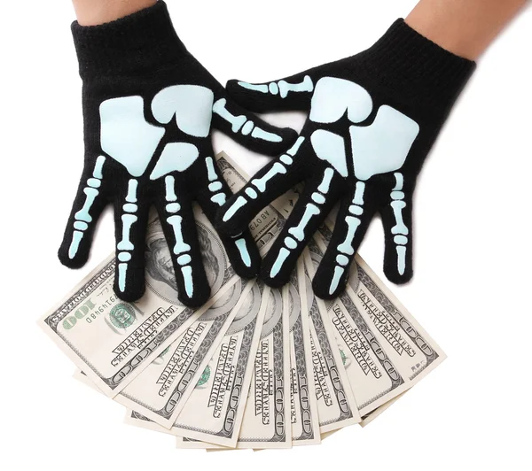 Dólares contas e mãos esqueleto isolado em branco, dinheiro — Fotografia de Stock