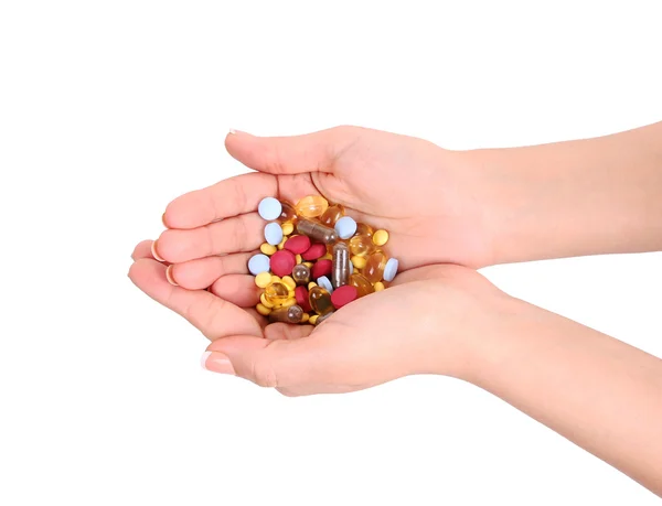 Pills in hands isolated on white — Stock Photo, Image