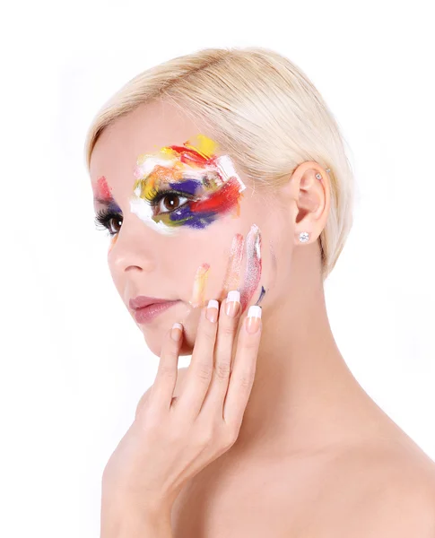 Mooi meisje met veelkleurige kunst make-up en Franse manicure geïsoleerd — Stockfoto