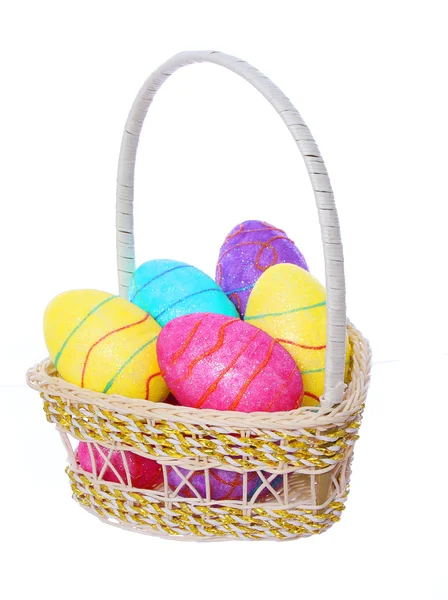 Easter eggs, colorful painted eggs in basket isolated on white background — Stock Photo, Image