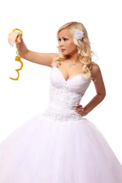 Bride in gold handcuffs. beautiful blonde young woman thinking isolated on white background. concept — Stock Photo, Image