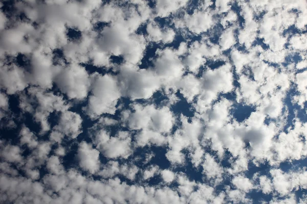 Blue sky with clouds and sun. Background — Stock Photo, Image