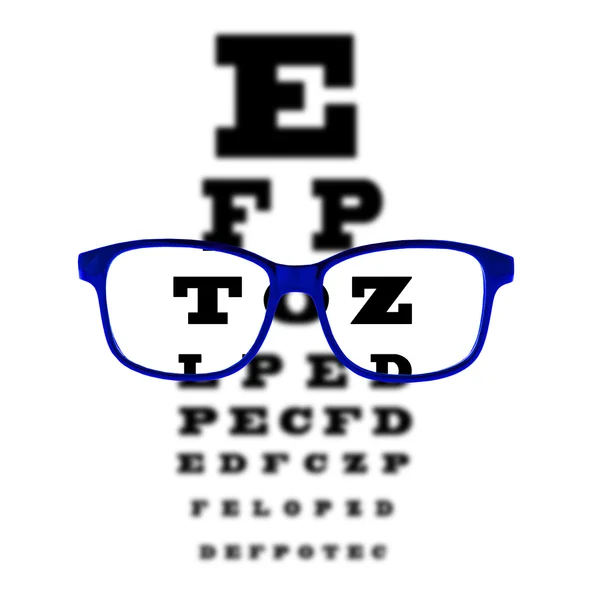 Eye vision test chart seen through blue eye glasses, white background isolated. — Stock Photo, Image