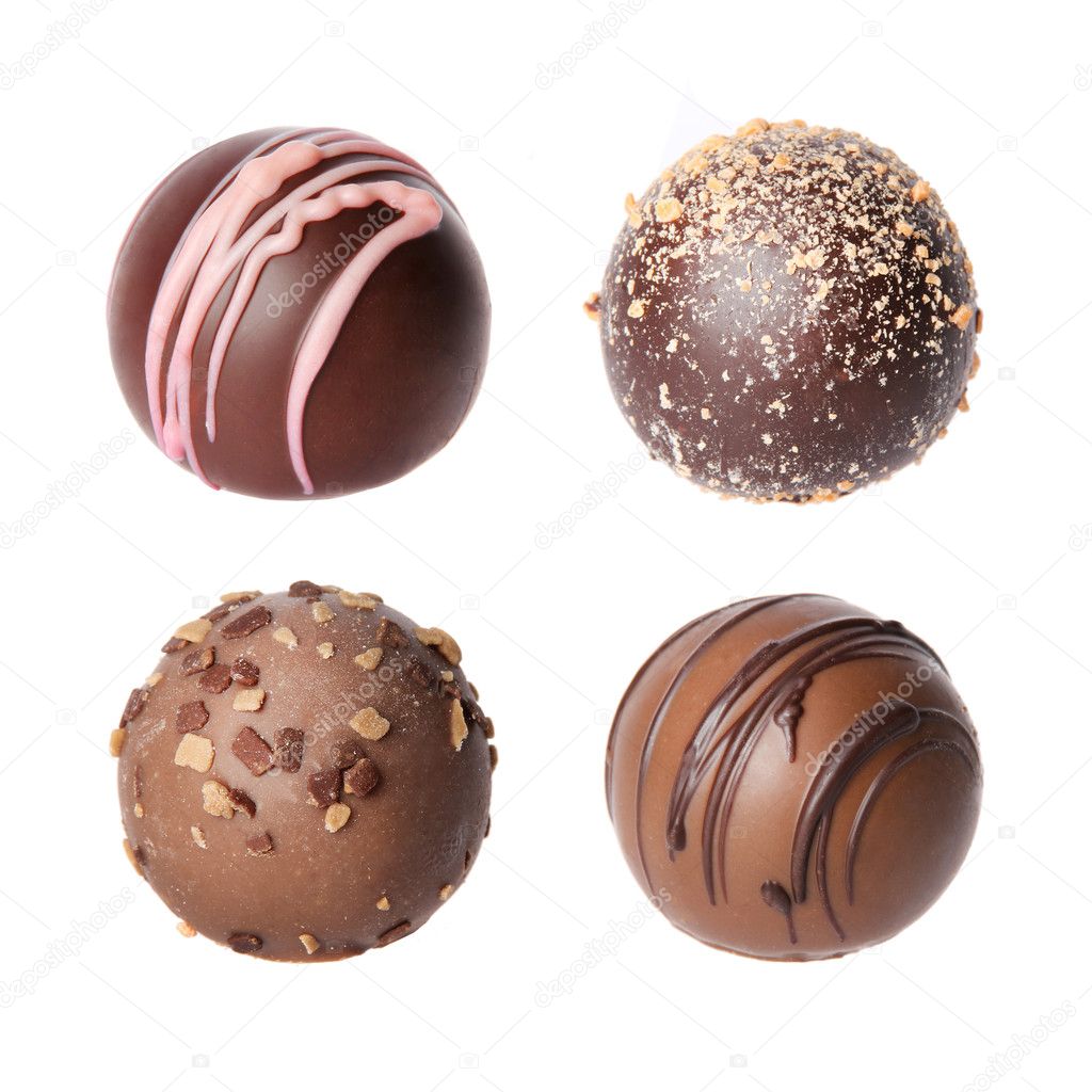 Chocolate candies collection. Beautiful Belgian truffles isolated on white background