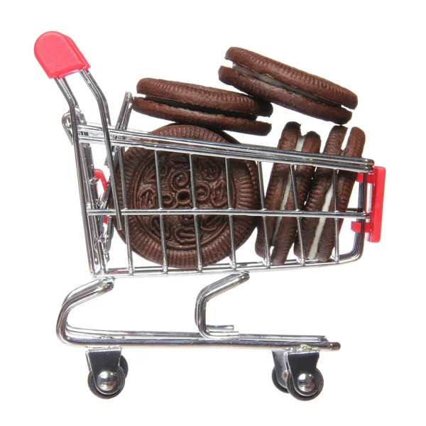 Oreo. Chocolate cookies in shopping cart isolated on white. concept. — Stock Photo, Image