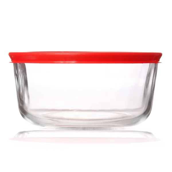 Glass food container with red plastic lid isolated on white background — Stock Photo, Image