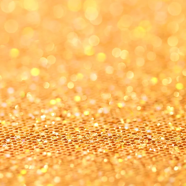 Bokeh. Christmas gold blinking background — Stock Photo, Image
