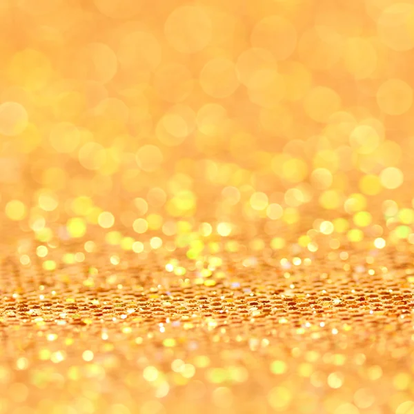 Bokeh. Natale oro lampeggiante sfondo — Foto Stock