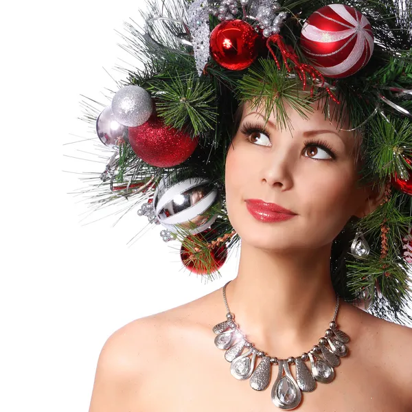 Kerstmis vrouw. mode meisje met Nieuwjaar ingericht kapsel. — Stockfoto