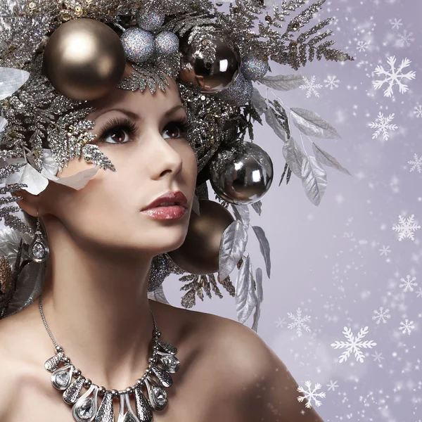 Christmas Woman with New Year Decorated Hairstyle. Snow Queen. P