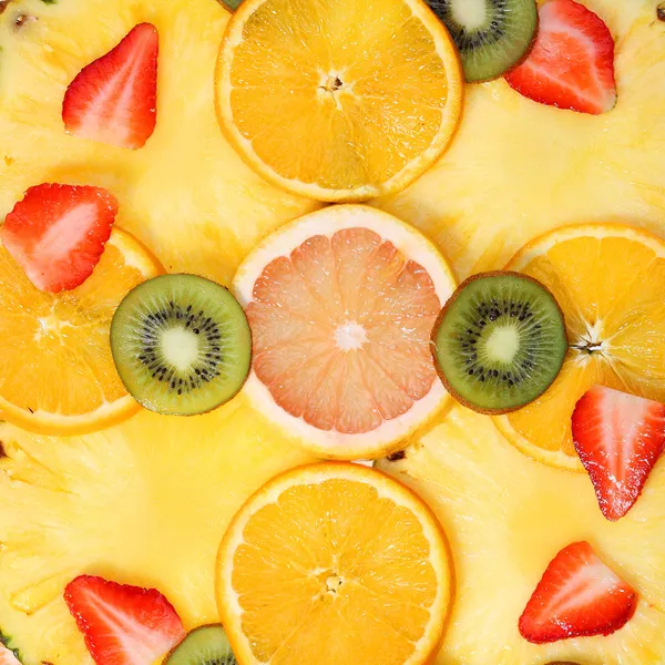 Geschnittene Früchte Hintergrund. Erdbeere, Kiwi, Ananas, Grapefruit, Orange — Stockfoto