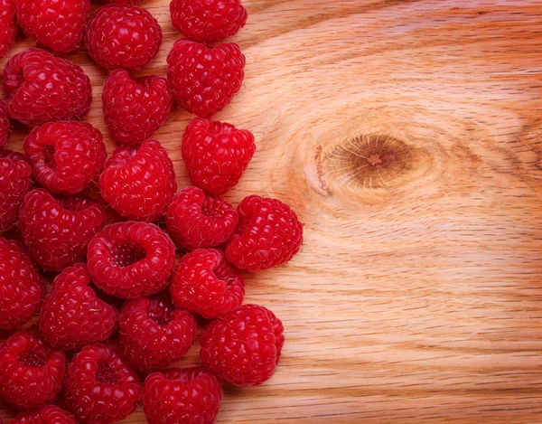 Raspberries on Wooden Background. — Stock Photo, Image