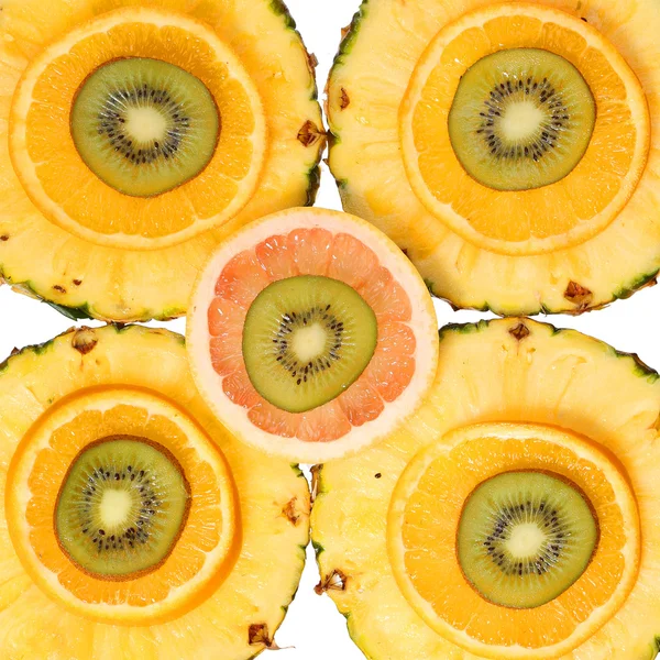 Geschnittene Früchte Hintergrund. Kiwi, Ananas, Orange, Grapefruit. Ich bin — Stockfoto