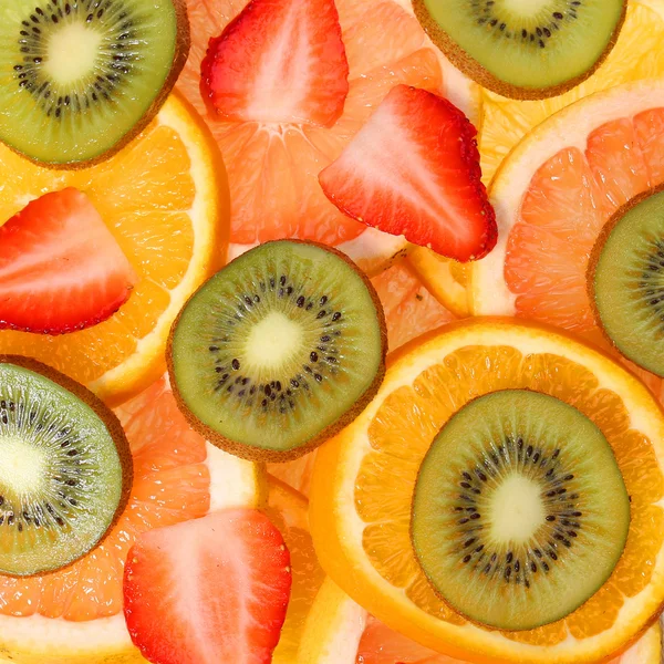 Frutas cortadas Fundo. Morango, Kiwi, Abacaxi — Fotografia de Stock