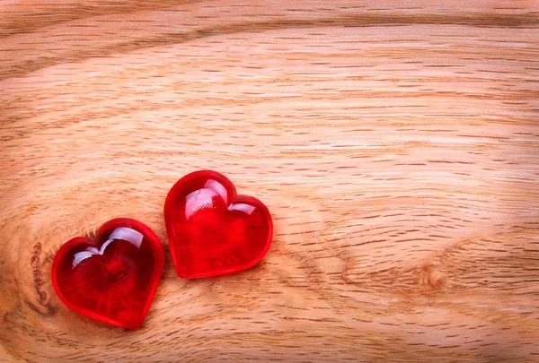 Fond Saint-Valentin. Coeurs sur la texture en bois — Photo