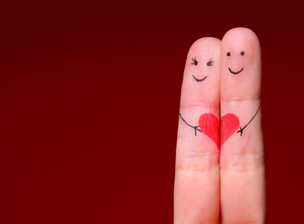 Happy Couple Concept. Two fingers in love with painted smiley Royalty Free Stock Images