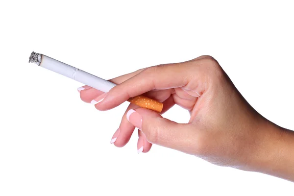 Cigarette à la main féminine isolée sur fond blanc. Fumer — Photo