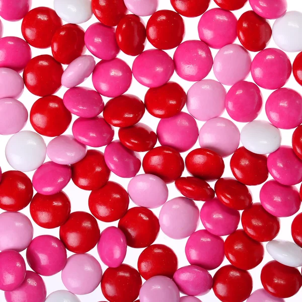 Chocolate Valentine 's candy revestido em rosa, vermelho e branco . — Fotografia de Stock