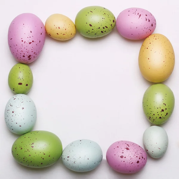 Easter eggs frame on white background. — Stock Photo, Image