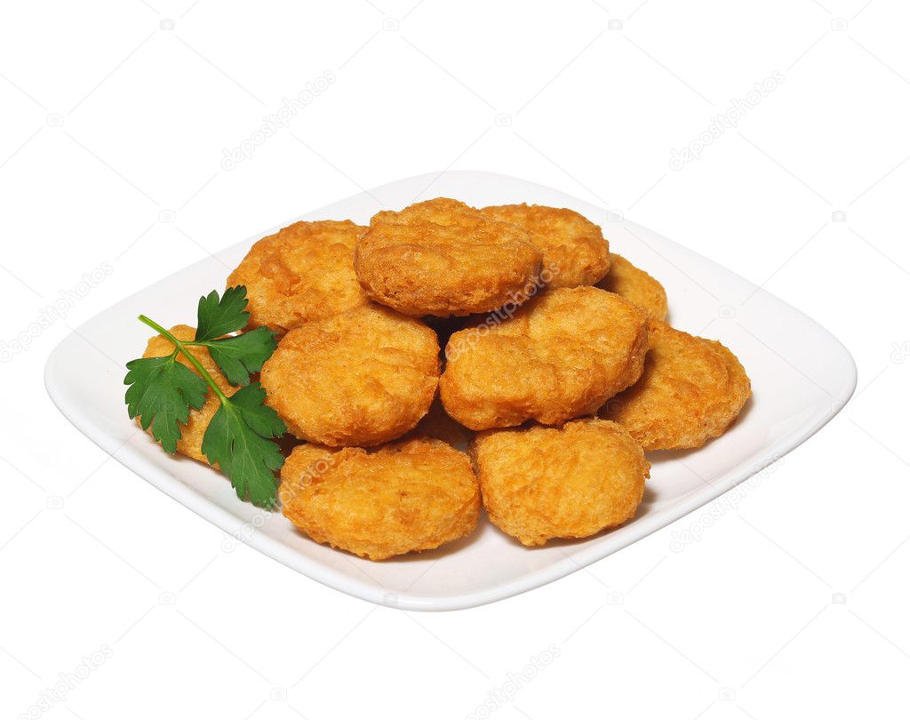 Chicken nuggets in plate isolated on white