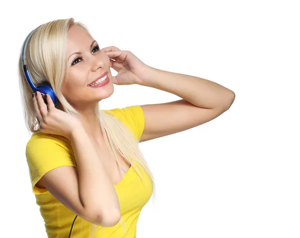 Chica rubia con auriculares aislados en blanco. Joven DJ —  Fotos de Stock