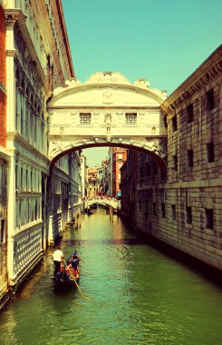Venice. Gondolas passing over Bridge of Sighs clipart