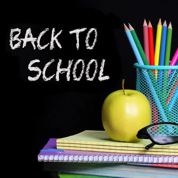 Back to School. School Supplies over black. — Stock Photo, Image