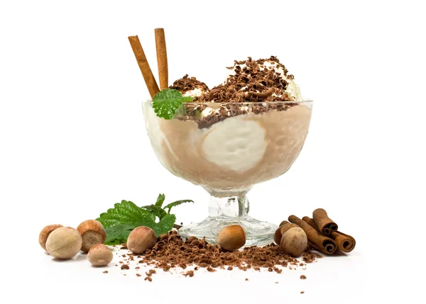 Ice cream with nuts, mint, cinnamon and chocolate — Stock Photo, Image