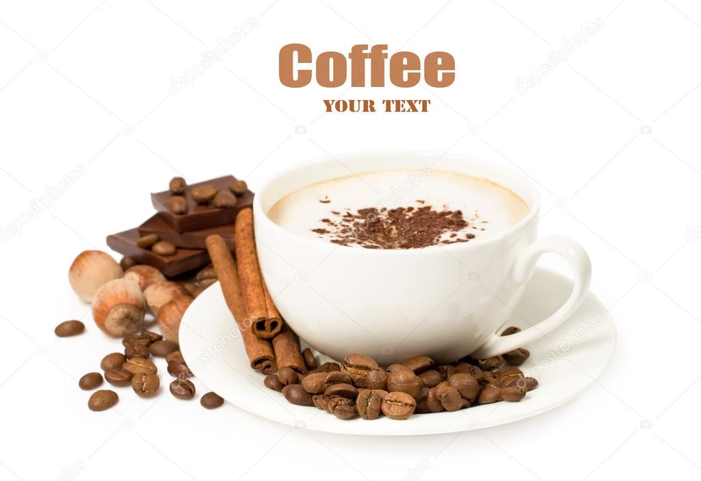 Cup of coffee with chocolate , cinnamon and nuts