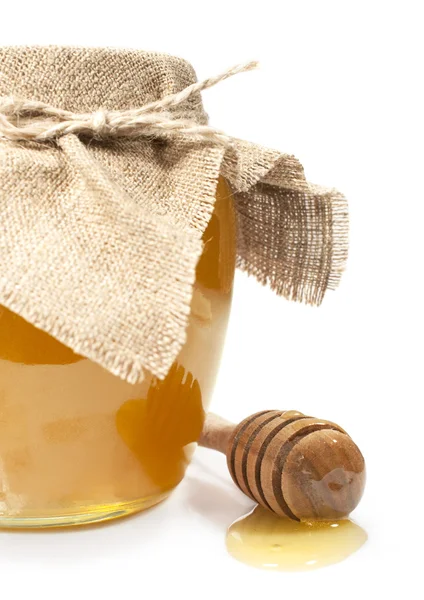 Jar of honey on a white — Stock Photo, Image