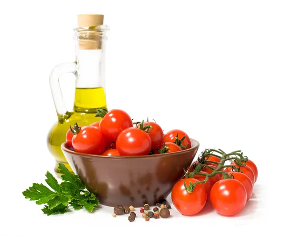 Cherry tomatoes with olive oil and spices — Stock Photo, Image