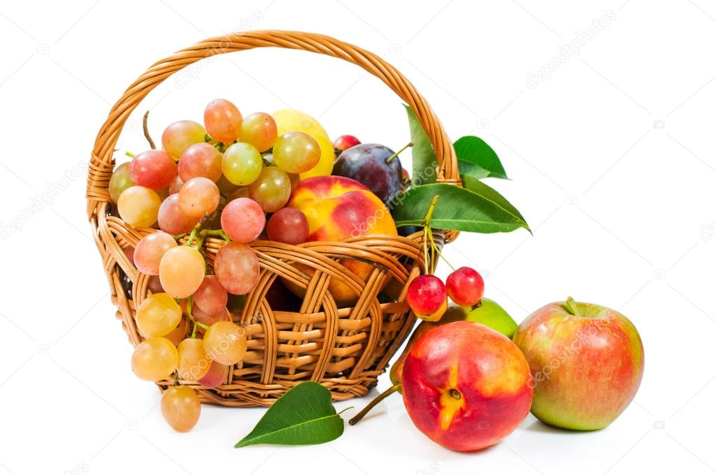 Basket of fruit : apples , grapes , peaches and plums