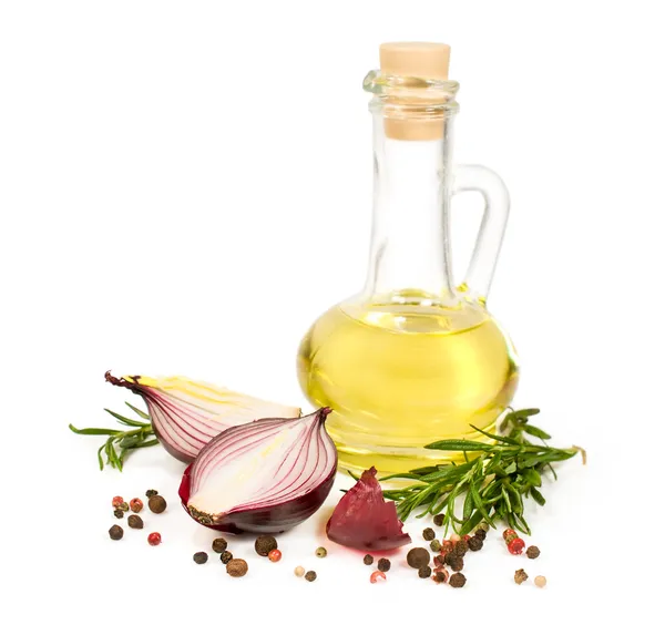 Sunflower oil in a bottle with red onions and rosemary — Stock Photo, Image