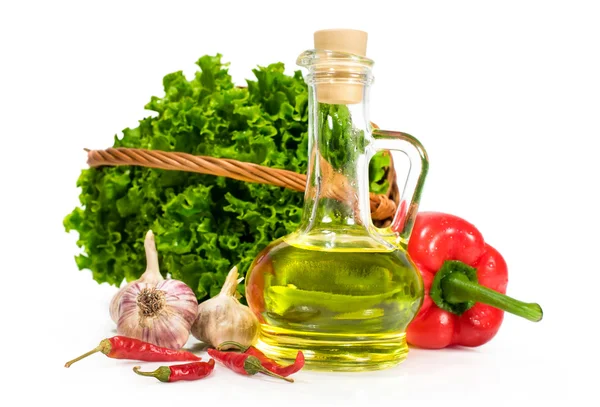 Olive oil with fresh vegetables — Stock Photo, Image