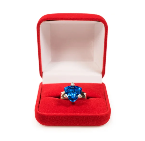 Ring with sapphire crystal in red box — Stock Photo, Image