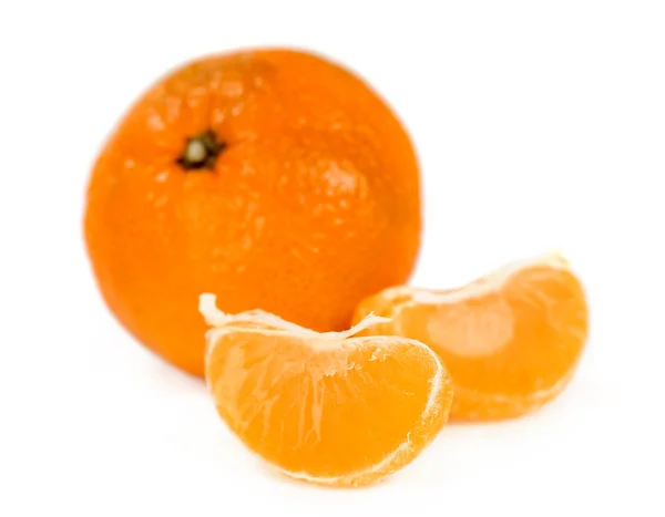 Ripe tangerine with slices close-up — Stock Photo, Image