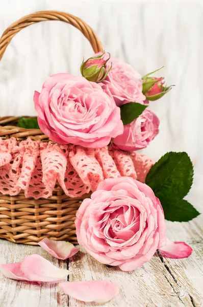 Pink roses in a basket — Stock Photo, Image