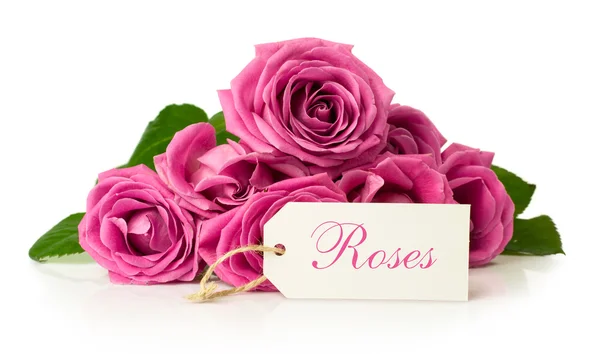 Boeket van roze rozen met kaart — Stockfoto